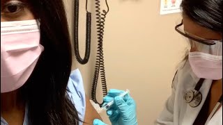 Watch As Family Doctor Gets Her Flu Shot