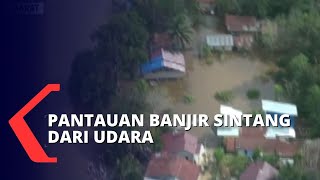 Tinjau Banjir SIntang, Wakapolda Kalbar Pastikan Kepolisian Siaga Membantu Warga Korban Banjir