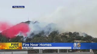 SAN RAFAEL BRUSHFIRE:  Firefighters battle a hillside wildfire near downtown San Rafael