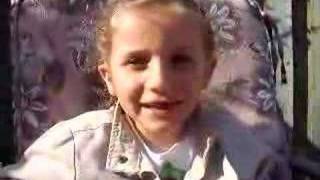 Mia at 6 years old talking about 2 implants VS 1