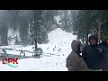 tourists enjoying fresh snowfall at doodpathri valley