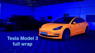 Tesla Model 3 full wrap in fluorescent orange vinyl