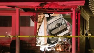 Car crashes through Livonia home, lands inches from man sleeping on couch