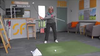 Rotate your body like a pro through impact for correct golf swing release