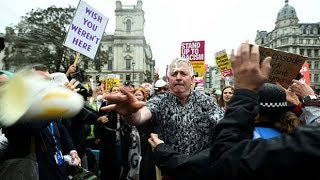 Trump supporter hit by milkshake amid chants of \