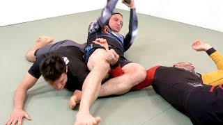 Double Rolling Omoplata Caught in Action {Warning: Graphic}