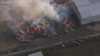 Fire officials give update on the ongoing 500 hay bale blaze in the East Valley