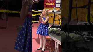 10-year-old Eden Judyth Barkmeier sings Anthem at SD State Youth Wrestling before Sunday School