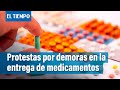 Protestas por demoras en la entrega de medicamentos en la droguería cruz verde | El Tiempo