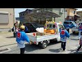 walking in a japan spring festival procession