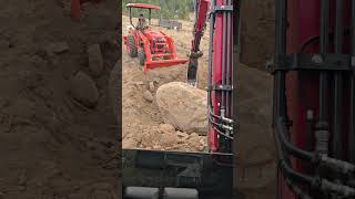 Yanmar sv 40 working out a 10k lb rock