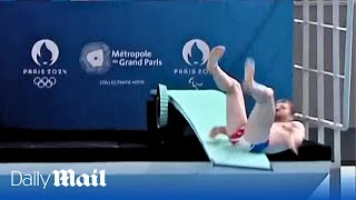 Embarrassing moment French diver slips during Olympic inauguration ceremony attended by Macron