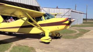 1947 Stinson Voyager coming out of hanger