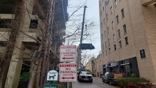 Dozens watch as huge crane lifts truck up to 3rd floor of Hotel Emma