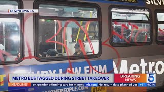 Metro bus attacked with fireworks, tagged during DTLA street takeover