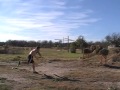 spear throw with both hands