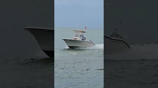 BOAT SPEEDING INTO THE VENICE FLORIDA JETTY