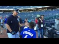 aaron judge signs an autograph for marcus stroman s little brother