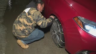 Snow and chain control slow holiday travel on I-80