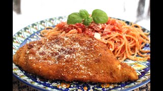 Romano crusted chicken with spaghetti