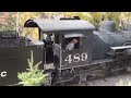 narrow gauge steam engine doing track maintenance.