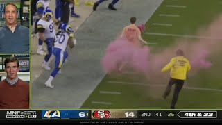 Fan runs on the Field during 49ers vs Rams Game - with ￼Bobby Wagner tackle