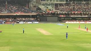 Cricket view from crowd. IPL match between RCB and MI. ABD's sixes and Bumrah's yorker.