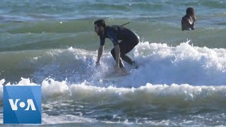 Italian Surfers Return to the Waves After Coronavirus Lockdown