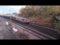 gbrf 69006 speeding past twin bridges woking on 28 11 22 with the empty gypsum from mountfield