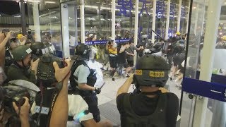 Live: Protesters and police clash at Hong Kong airport | ITV News