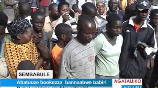 Abatuuze bookezza bannaabwe babiri