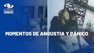 Clientes dieron detalles sobre robo en restaurante de Bogotá: "Le pone el revólver en la cara"