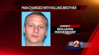 Man charged with killing brother