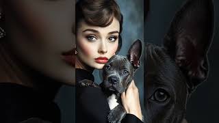 Audrey Hepburn holding a Great Dane puppy