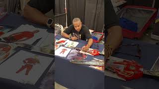 Selwyn Ward from PR turbo signs Power Sword (Red Ranger Exclusive)  @ PMC 2024