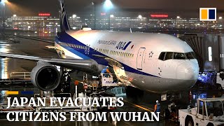 Japan flies citizens home from virus-hit Wuhan