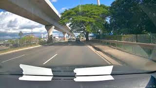 Car Cutting Across/Off Two Lanes of Traffic To Make Turn