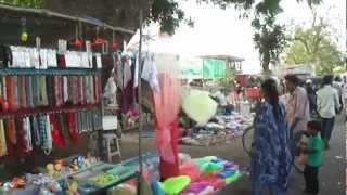 Walking around the Weekly Sunday Market Bazaar at Viraval, Navsari, Gujarat, India; 29th April 2012