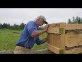 the human hay baler jim kovaleski demonstrates his custom manual baler