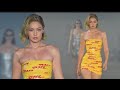 Gigi Hadid Takes Fashion to New Heights in a DHL Parcel Tape Mini Dress at Paris Fashion Week