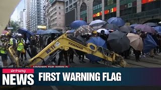 Warning flag spotted at Chinese army barracks as protests escalate across Hong Kong