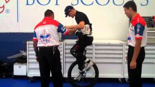 IndyCar Driver James Jakes learning to ride a unicycle.