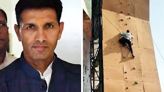 Watch: MP sports minister Jeetu Patwari scales 40-ft rock climbing wall