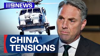 Chinese warplane fires flares in front of Australian helicopter | 9 News Australia