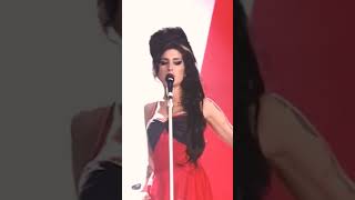 Amy's iconic performance of 'Rehab' live at the BRIT Awards 2007.