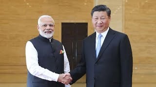 Xi and Modi begin informal summit with museum tour