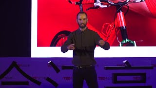 Why do I ride bicycles while all others are driving? | Jacob Klink | TEDxHejiangting
