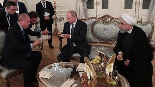 Üçlü zirvede Kur'an'dan alıntı yapan Putin'in Erdoğan ve Ruhani'yi güldüren cevabı