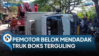 KRONOLOGI Truk Boks Muatan Es Batu Terguling di Jalan Jagir. Sopir Kernet Luka Ringan \u0026 Syok