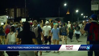 Protesters march through downtown stopping at Tipsy Crow